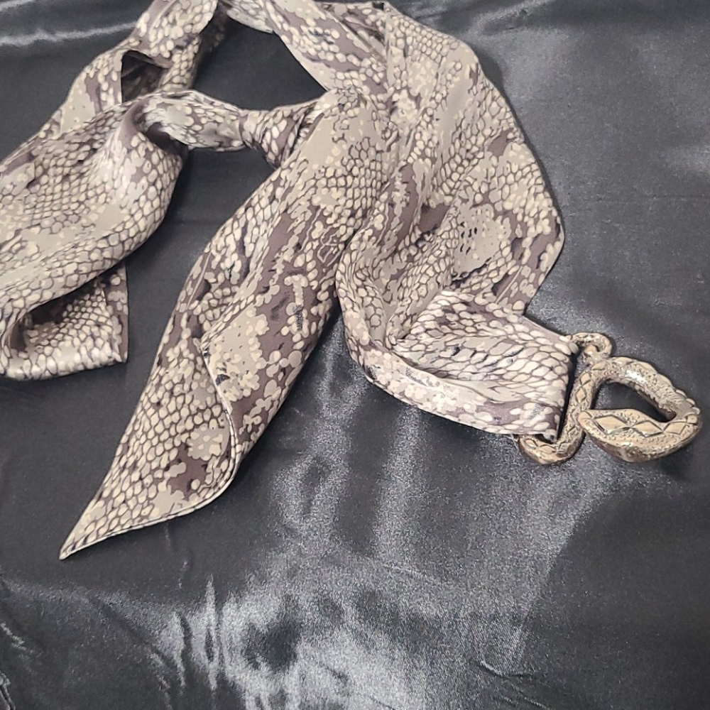 Silky belt with silver head